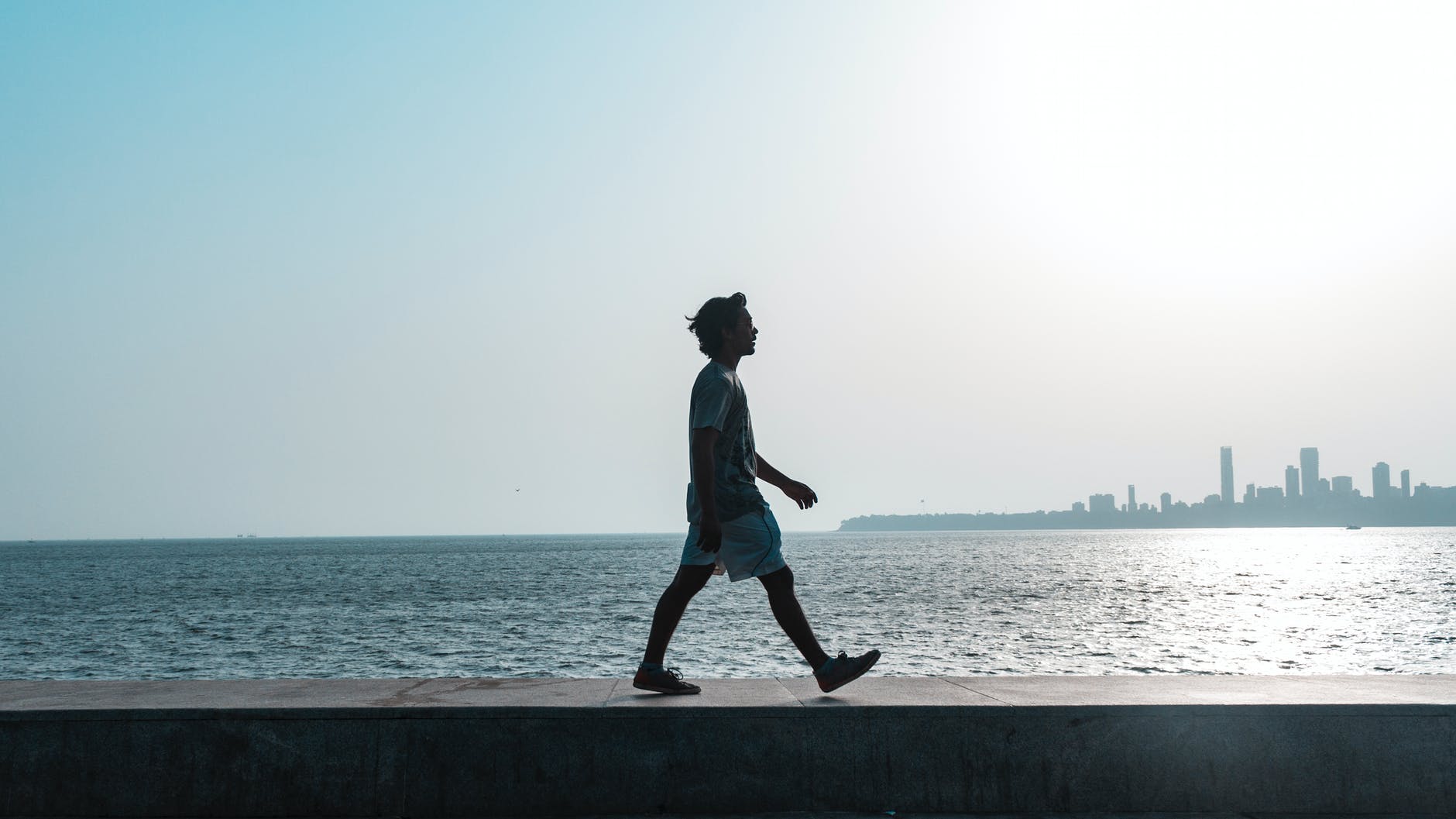 man walking near body of water
healthy while travelling