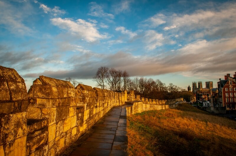 York city wall with the sunlight reflecting on it.