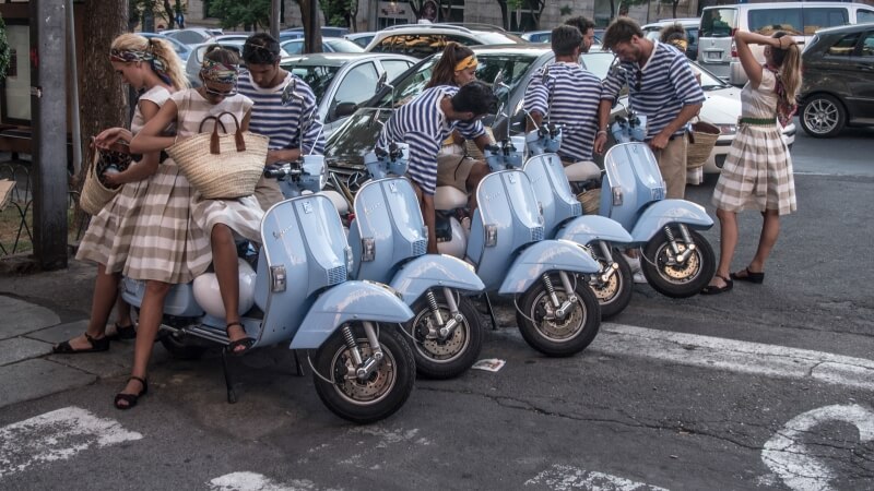 Vespas with people in Italy